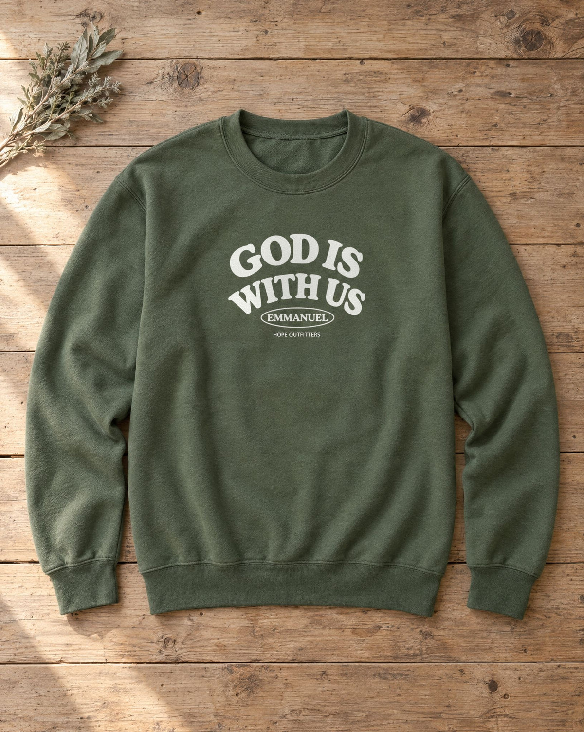 Flat lay of the Military Green Emmanuel God With Us crewneck sweatshirt with white print