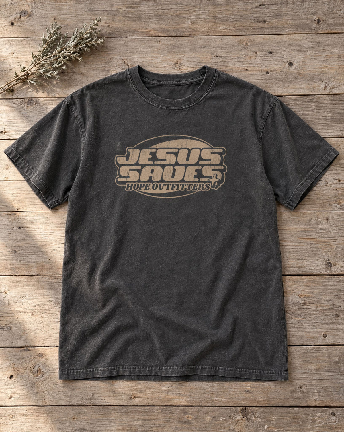 Jesus Saves Retro Tee - graphite tee flat lay on weathered wood showing the Jesus Saves front print