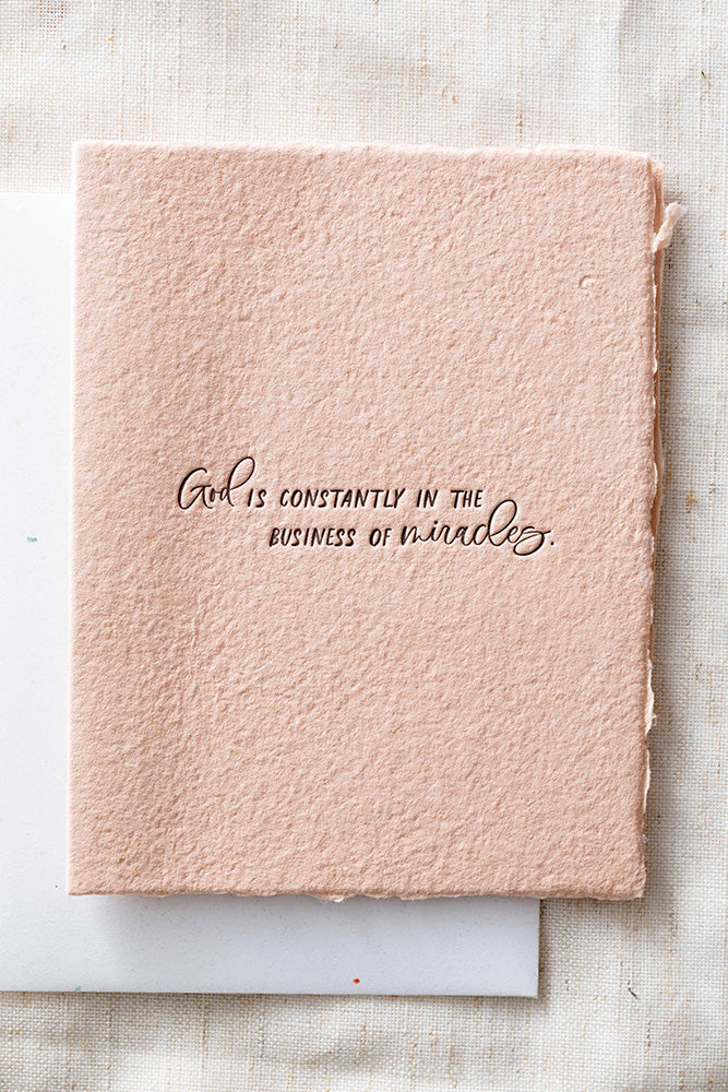 Fair-Trade God is in the Miracle Business Greeting Card