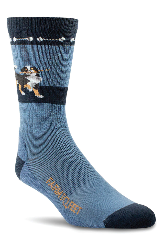 USA-made merino Dog Crew socks, blue with a dog design at the cuff