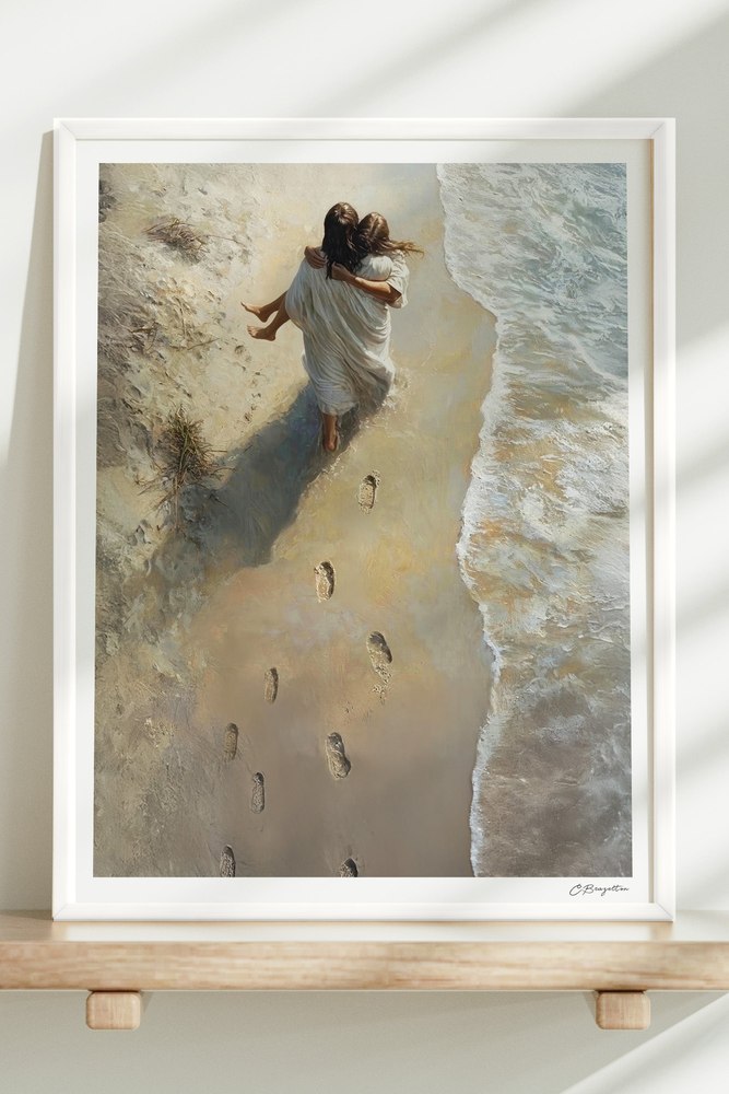 He Carried Me art in a white frame on a wooden shelf